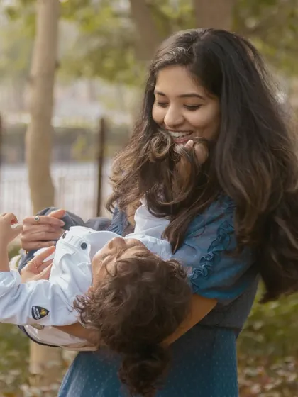 Capturing the playful love between a mother and her son, forever frozen in time. Outdoor sessions like this allow for natural movement and genuine smiles, resulting in truly authentic portraits.