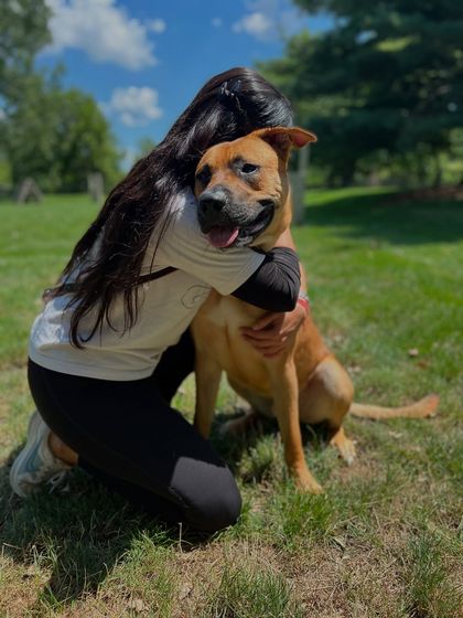 A heartfelt hug with Doug. Learning to train dogs has been a healing and cathartic process for me.