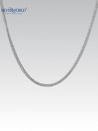 This intricately linked silver chain showcases our craftsmanship. Its sturdy and classic design is suitable for both men and women, reflecting our heritage of quality.