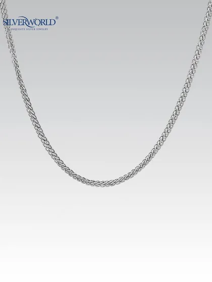 This intricately linked silver chain showcases our craftsmanship. Its sturdy and classic design is suitable for both men and women, reflecting our heritage of quality.