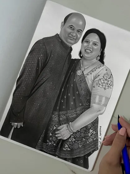 A custom A4 charcoal sketch of a couple, commissioned as a special gift. I paid close attention to the intricate embroidery on their traditional outfits to make the portrait truly personal.