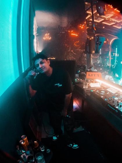 A quick moment to chill by the booth at Club LITT before the set kicks off.