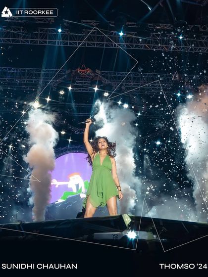 Sunidhi Chauhan strikes a power pose amidst smoke cannons at Thomso '24, IIT Roorkee. This was a viral moment, and our production amplified it.