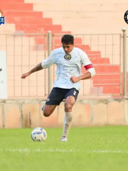 Our captain takes a powerful strike, leading the charge from the front.