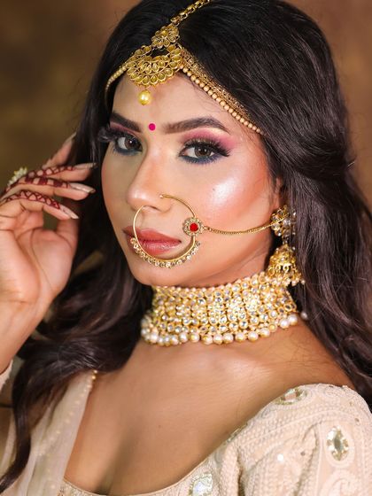 A close-up of this elegant bridal makeup, showcasing the flawless base and defined eyes.