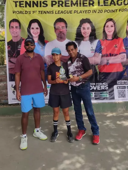 Another champion from our TPL-ITA tournament proudly displays his trophy. We focus on creating a positive and celebratory atmosphere to conclude every competition we host.