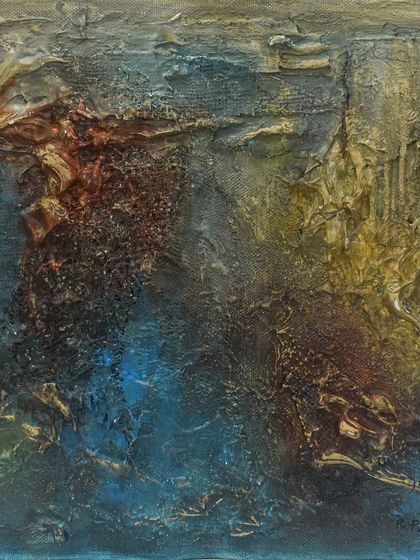 The combination of deep blues and rustic browns in this piece evokes a sense of earth and sky. The textures add a raw, natural quality to the abstract landscape.