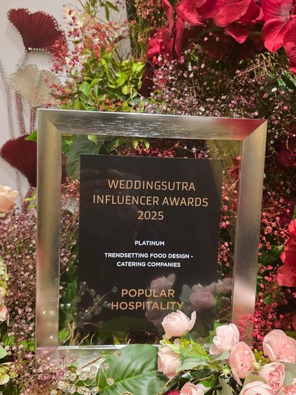 A close-up of our Platinum award from the WeddingSutra Influencer Awards 2025. This award inspires us to keep setting new trends in food design.
