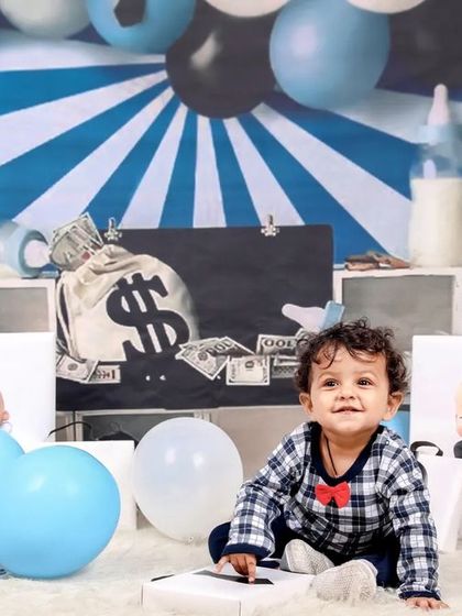 The 'Boss Baby' is in the house! This theme is perfect for capturing the confident and playful nature of one-year-olds.