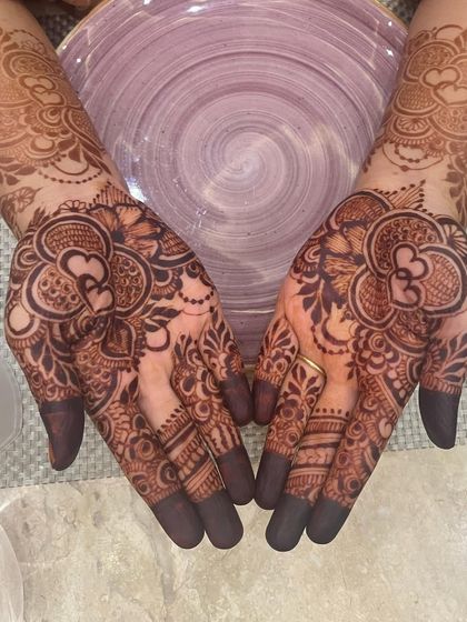 The final, beautiful stain from my bestie's mehendi session. The deep color on the fingertips and the rich pattern on the palms is just perfect.