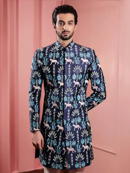 We believe in bold design choices. This Indo-Western jacket features a contemporary animal and botanical print, offering a modern and artistic take on festive menswear for those who want to stand out.