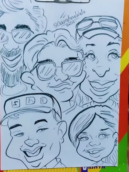 A full family caricature with multiple faces. I work to capture each person's likeness while creating a fun group portrait.