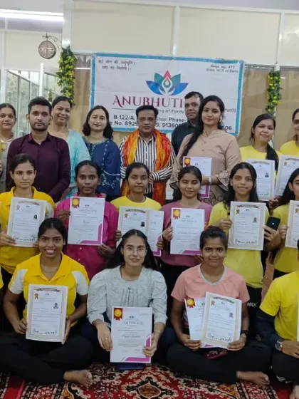 Certification day is always a moment of pride. Here is another group of newly certified yoga trainers, holding their government-recognized certificates after completing their training at Anubhuti Yog.