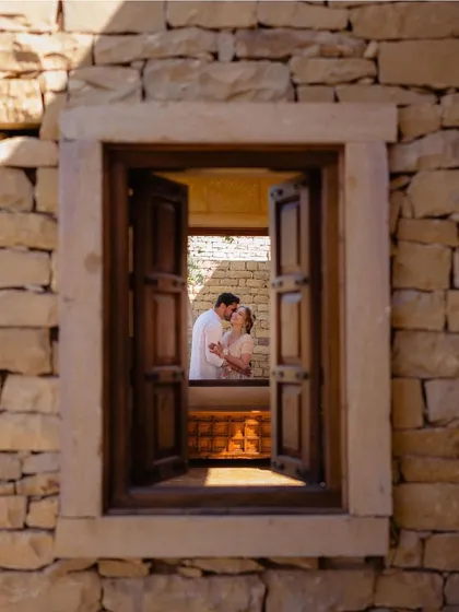 A quiet moment captured through a window at Suryagarh. This framed portrait of Priyangi and Kishan feels intimate and timeless, like a secret glimpse into their love story.