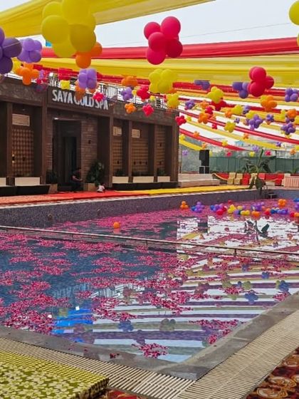 The swimming pool at Saya Gold Avenue, prepared for the Chhath Pooja festival. The space was transformed to accommodate the community's traditions with grace and respect.