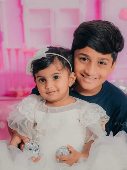 A sweet moment between brother and sister during her Barbie-themed birthday shoot. He was so gentle and proud to be in the photo with her.