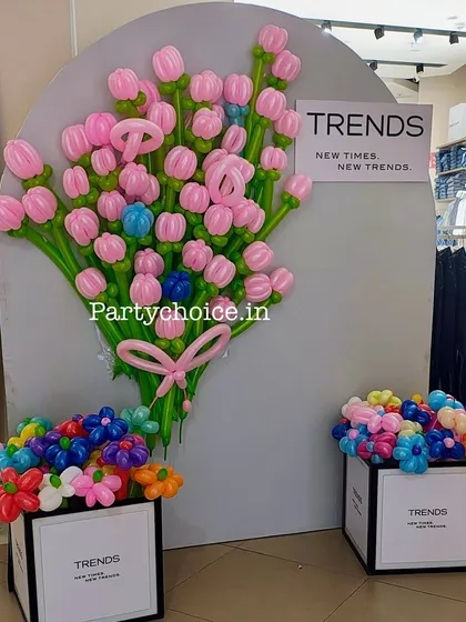 We also create unique decor for retail spaces and brand activations. This display for a 'TRENDS' store features a large bouquet and flower boxes, all intricately crafted from modeling balloons to attract customer attention.