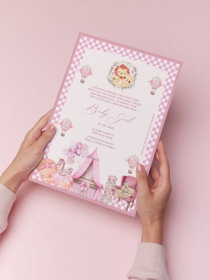 A heartwarming birth announcement for a baby girl. This printed card is filled with pastel charm, from the pink checkered border to the delicate illustrations of a nursery, celebrating a beautiful new beginning.