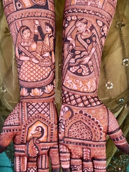 This design features a dancing couple on the forearms, with peacocks and intricate patterns on the palms.
