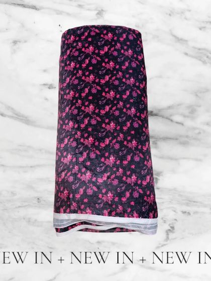 This black velvet with a delicate pink floral print is a romantic and luxurious option for your winter wardrobe.
