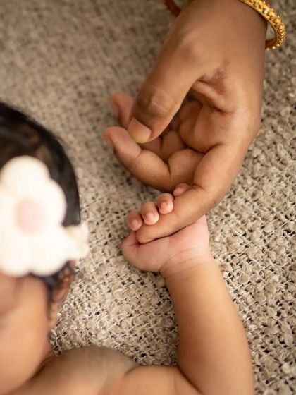 The smallest touch. A newborn holding onto their mother's finger is a simple, powerful image of connection and trust. These are the moments that melt my heart.