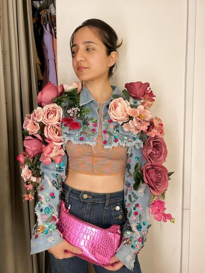 Another angle of the embellished floral jacket, showing how the arrangement of flowers creates a dramatic silhouette. This is an example of how I build sculptural elements onto clothing.