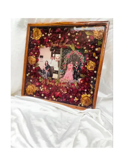 These images and videos showcase various angles and the creation process of my custom wedding and anniversary varmala preservation frames. Each one is made with love to turn your special memories into a timeless treasure.
