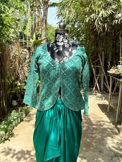 The mirror work jacket is the star of this outfit. It can be paired with other pieces in your wardrobe too.