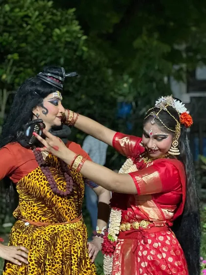 A playful moment between Shiva and Parvati. Portraying these divine characters requires a deep understanding of their stories and personalities.