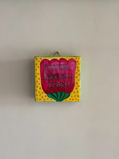 "Inspire, Innovate, Impact." A vibrant, floral-themed mini canvas with a powerful message, designed to add a pop of color and motivation to any space.