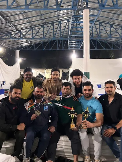 The team celebrating together after a successful competition. We win together and we lose together. This is the power of our gym.