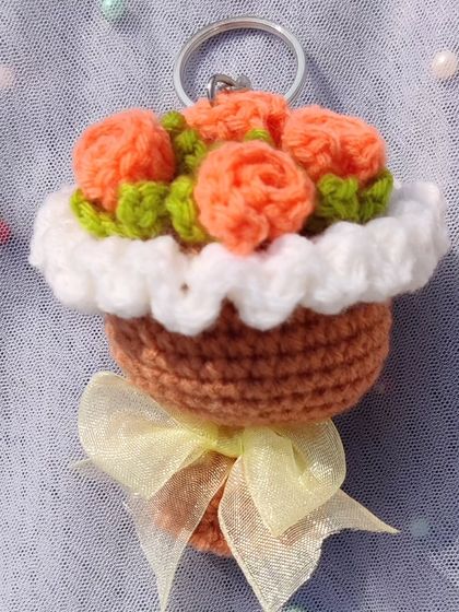 My most popular item, the mini bouquet keychain. I create these in various flower types like roses and sunflowers, and in a wide range of color combinations.