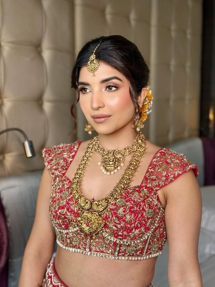 A stunning portrait showcasing the soft, glowing makeup. I teach how to achieve this lit-from-within radiance that every bride desires.