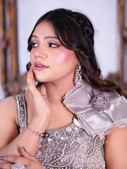 A close-up of the rose detail on the shoulder.