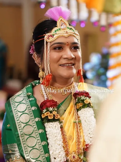 A candid shot of the bride during the ceremony. Her makeup is designed to look beautiful from every angle, even in unposed moments.