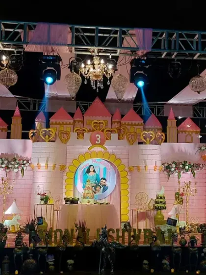 We can build a fairytale castle for your little royal's big day. This large-scale stage production features custom castle architecture, elegant lighting, and marquee numbers, perfect for a truly grand princess or prince themed birthday party.