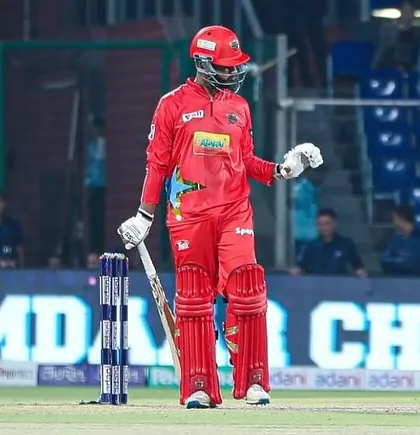 Dhruv Singh standing at the crease after reaching a milestone. His composure under pressure is a key strength.
