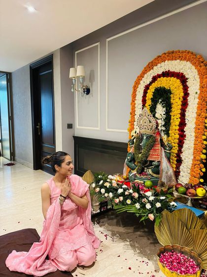 Gratitude and joy during the Ganpati festival. The soft fabric and color of this ethnic suit make it ideal for daytime festivities at home.