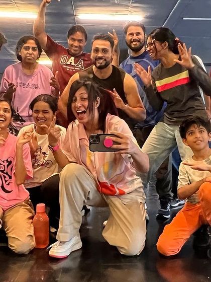 The smiles say it all. A happy group photo after a challenging but rewarding dance class. This is the energy and camaraderie that defines the HHI family.