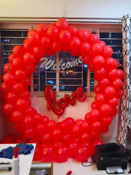 Another shot of the all-red welcome home decor, showing how it can transform a room and create a powerful statement of love.