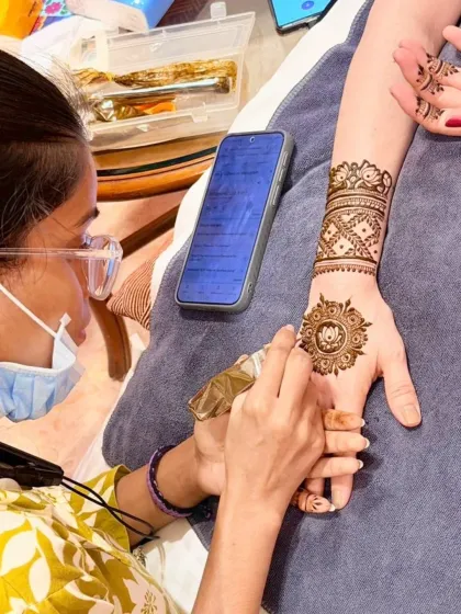 A behind-the-scenes look at a session with a client from Japan. We used a phone with Google Translate to chat, proving that art and smiles are all you need to connect.