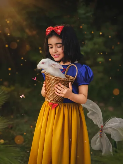 A fairytale comes to life in this Snow White inspired photoshoot. These fantasy sessions are where we let imagination run wild, creating an enchanted storybook memory with your child as the hero.