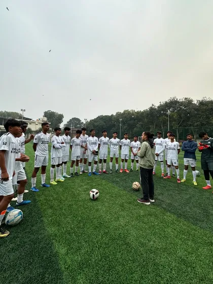 Our U17 head coach giving a pre-match pep talk. We focus on mental preparation and team unity before every big game.
