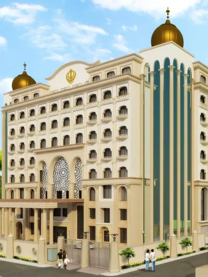 The facade of Gurudwara Anandpur Sahib, where we introduced modern elements like large glass panels alongside traditional golden domes. This project demonstrates our ability to reinterpret sacred architecture for a contemporary context while preserving its devotional essence.