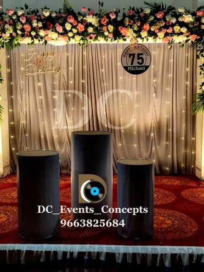 We also cater to milestone birthdays for adults. This is an elegant stage we designed for a 75th birthday celebration, featuring a floral frame and a fairy light curtain for a classic and distinguished look.