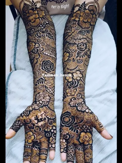 A collection of my floral-heavy bridal designs. I love using roses and leafy vines to create a flowing, elegant look that covers the hands and arms.