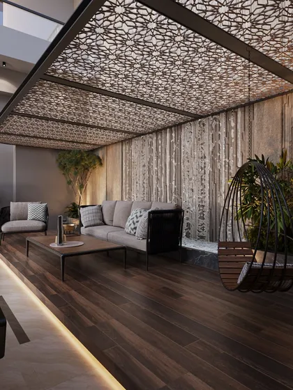 Another view of the pergola seating area, this time at night. We use integrated lighting in the flooring and under the pergola to create a warm, inviting atmosphere, making the space usable and beautiful at all hours.
