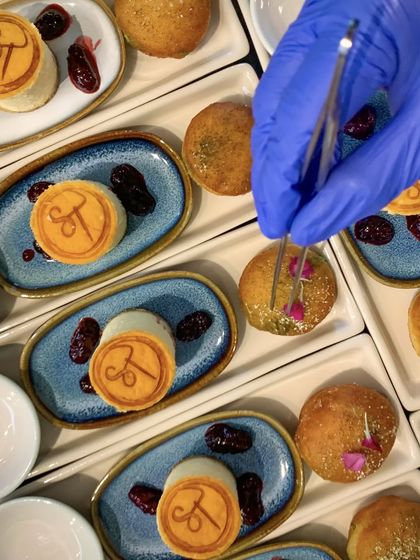 A sweet throwback to a hot-pot luncheon. The dessert was a Japanese cheesecake and a miso custard bombolini, finished with my signature 'ST' logo.