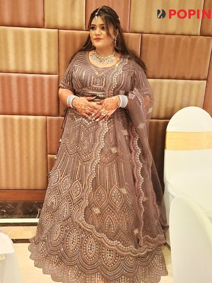 Another view of this client's gorgeous look, proving that a rented outfit can be absolutely iconic.