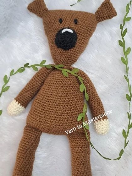 A fun shot of Mr. Bean's Teddy decorated with a vine.